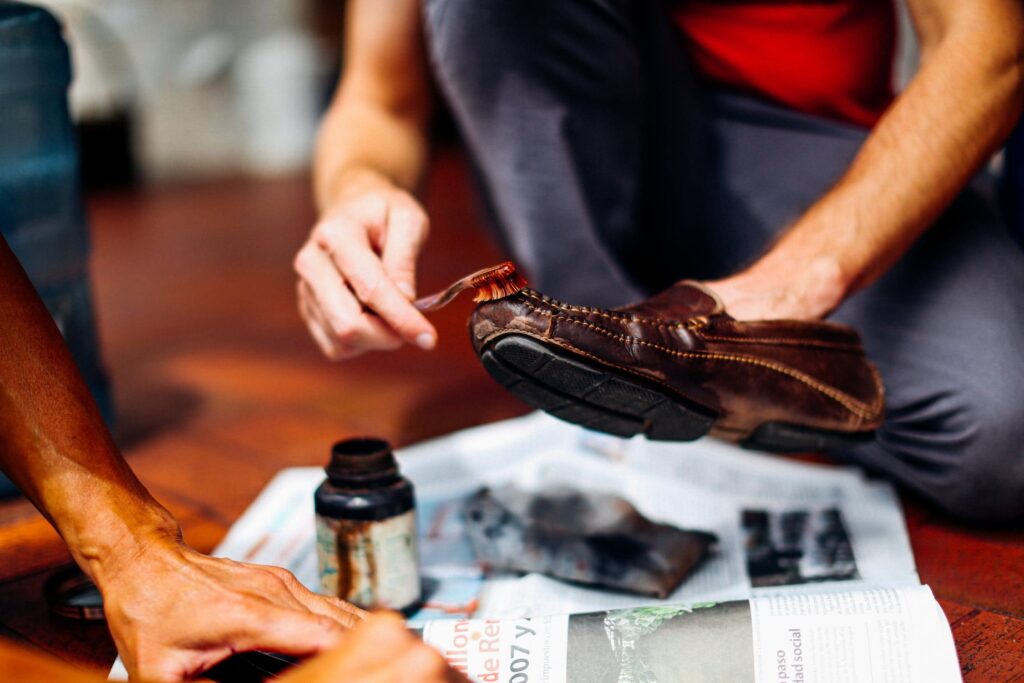 Clean your leather shoes shining and buffing